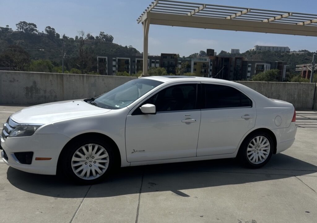 2012 Ford Fusion Hybrid available for rental in San Diego from Coastal Crest Mobility